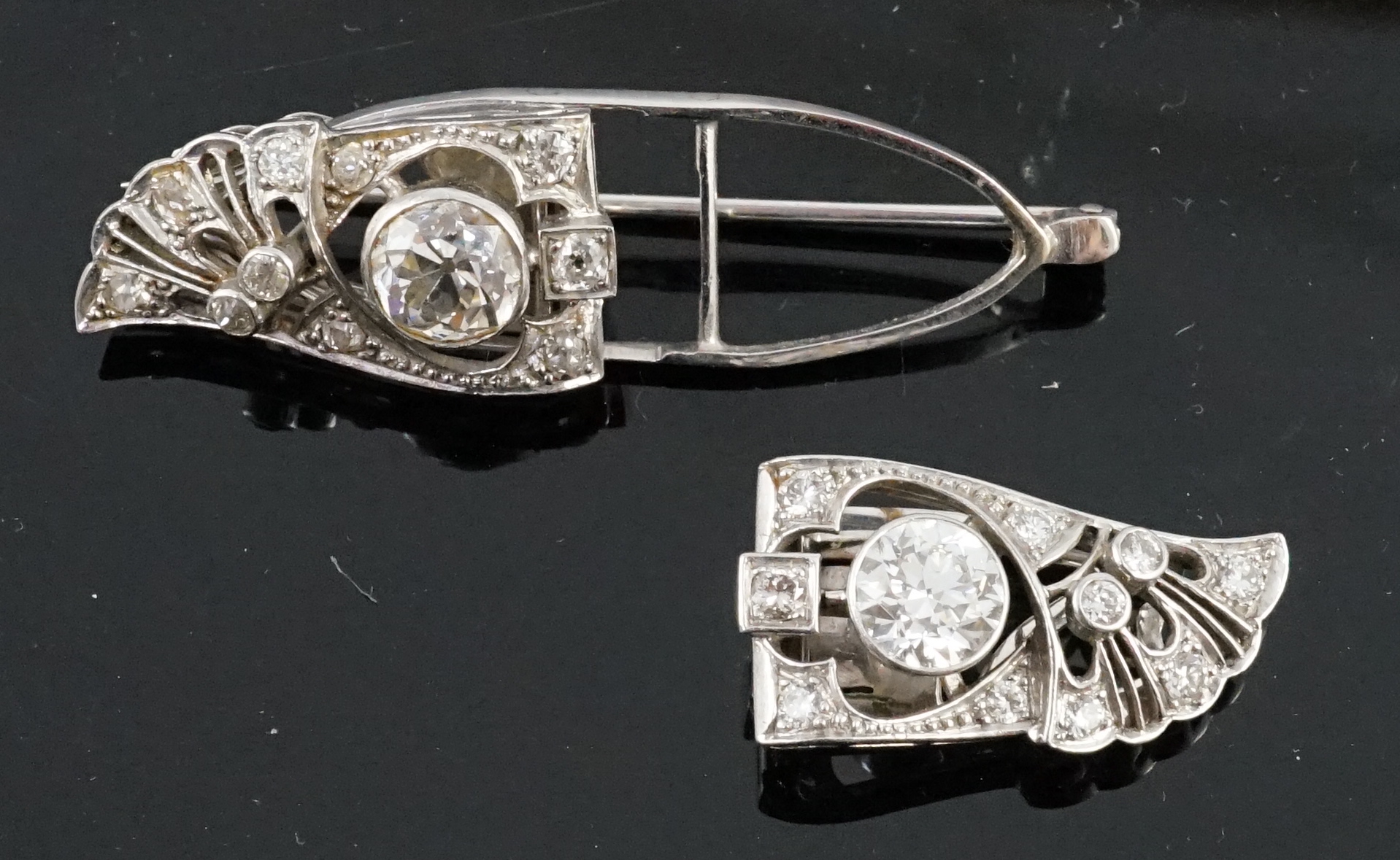 A good Art Deco platinum and diamond cluster set double clip brooch